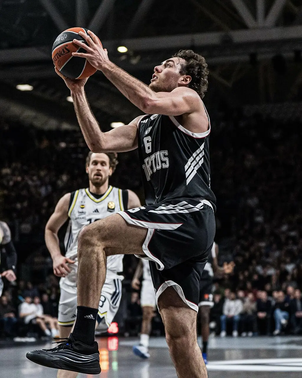 Alessandro Pajola in azione con la Virtus
