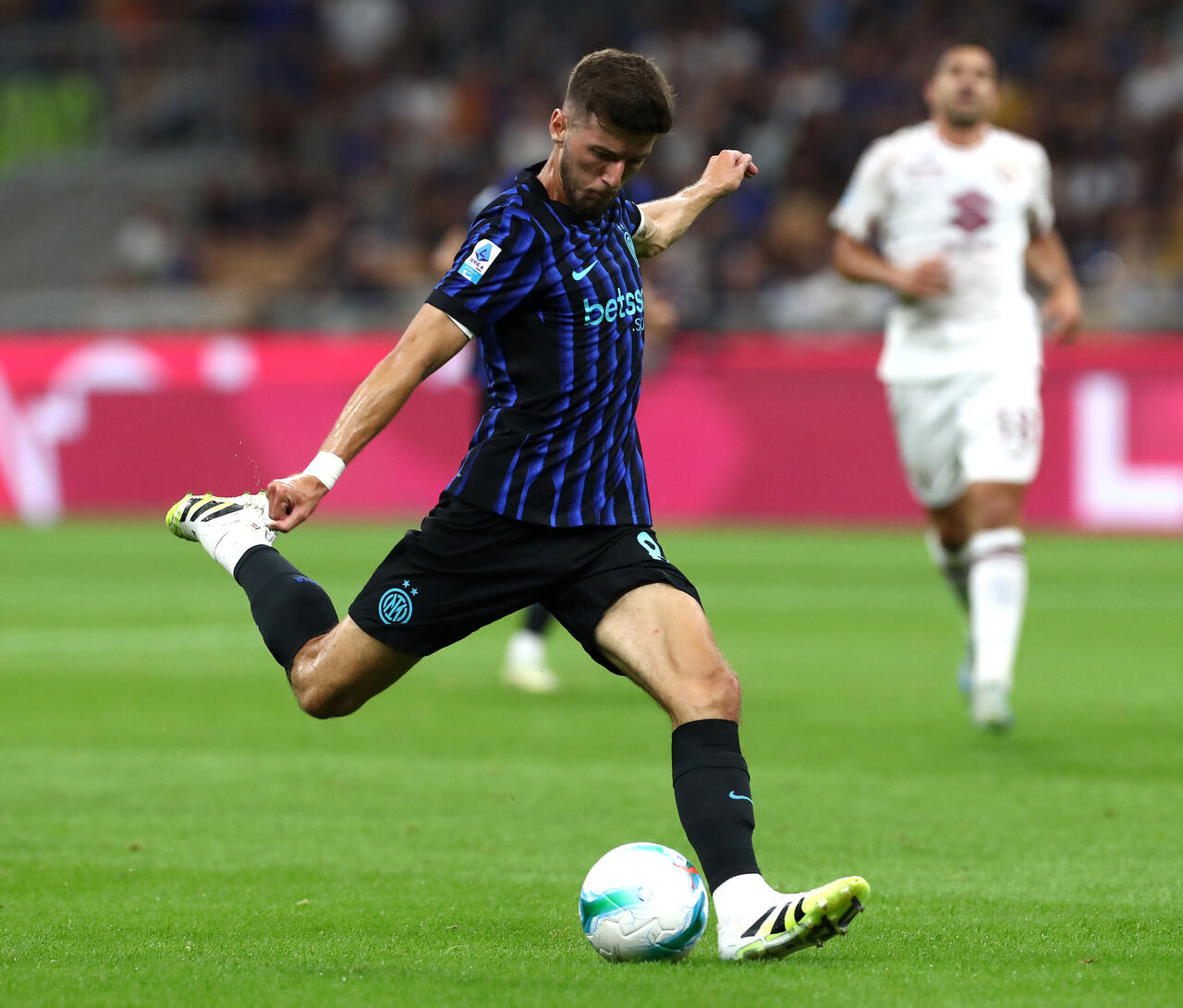 Petar Sucic of Internazionale takes a shot during the Serie A match between FC Internazionale and Torino FC at Giuseppe Meazza Stadium on August 25, 2025 in Milan, Italy.