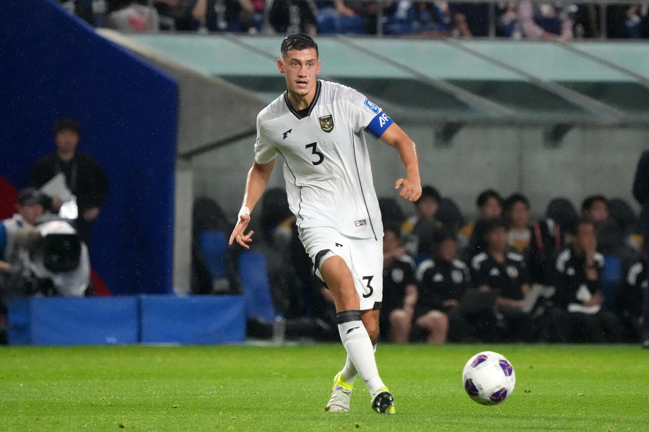 Jay Idzes of Indonesia in action during the FIFA World Cup Asian Third Qualifier Group C match between Japan and Indonesia at Panasonic Stadium Suita on June 10, 2025 in Suita, Osaka, Japan.