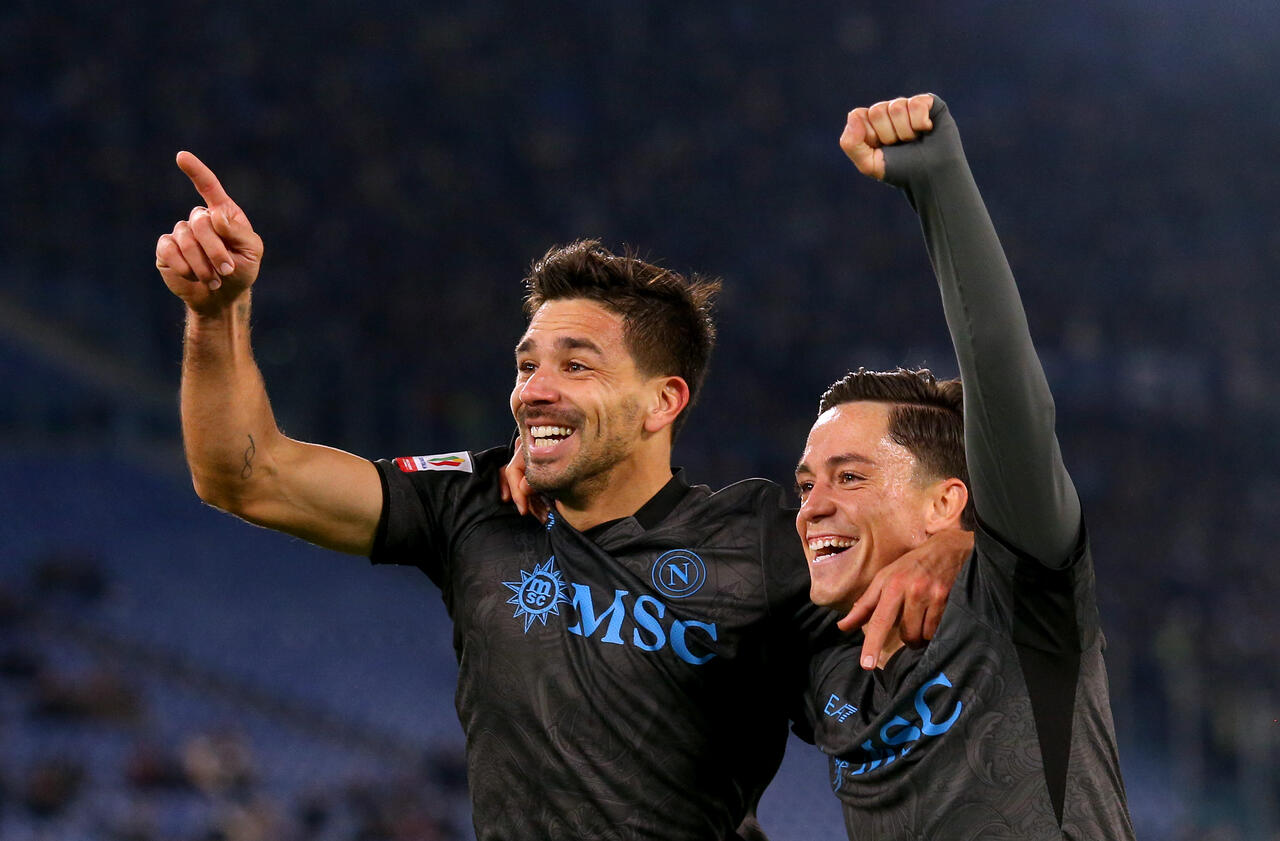 Giovanni Simeone celebrates scoring his team's first goal with teammate Giacomo Raspadori during the Coppa Italia match between SS Lazio and Napoli at Stadio Olimpico on December 05, 2024 in Rome, Italy.