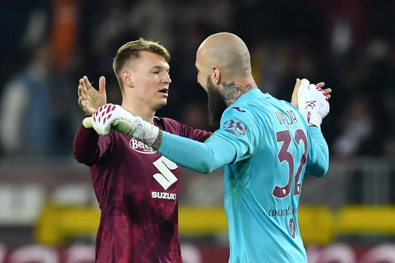 Perr Schuurs and Vanja Milinkovic-Savic of Torino FC celebrate victory after the Serie A match between Torino FC and Bologna FC at Stadio Olimpico di Torino on March 06, 2023 in Turin, Italy.
