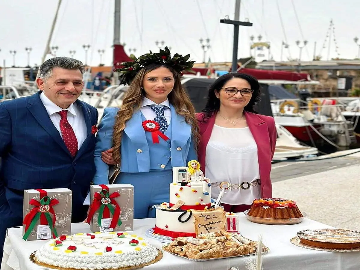 Angela con papà Giuseppe e mamma Antonella