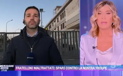 Collegamento in diretta di Pomeriggio Cinque, inviato raggiunto da proiettili