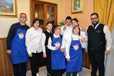 Un gruppo di giovani ospitati all'evento Winner's Pizza