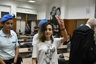 Sono una Rifugiata, Non un Immigrato"