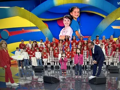 Zecchino D’Oro Valentina e Delia le Calabresi con Carlo Conti