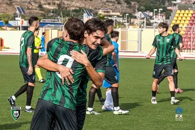 L'abbraccio fra Milazzo e Serruto (FX Media Sport)