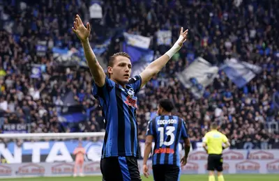 BERGAMO, ITALY - APRIL 13: Mateo Retegui of Atalanta celebrates scoring his team's first goal during the Serie A match between Atalanta and Bologna at Gewiss Stadium on April 13, 2025 in Bergamo, Italy. (Photo by Pier Marco Tacca/Getty Images)
