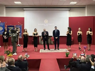 Michele e Antonio Affidato sul palco del Rotary