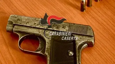 Pistola e proiettili nel cassetto